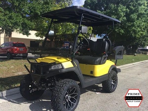 Yellow Aluma 4 Passenger Lifted Golf Cart affordable golf cart rental, golf cart rent virginia beach